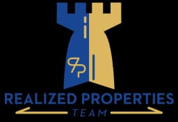 Realized Properties castle logo